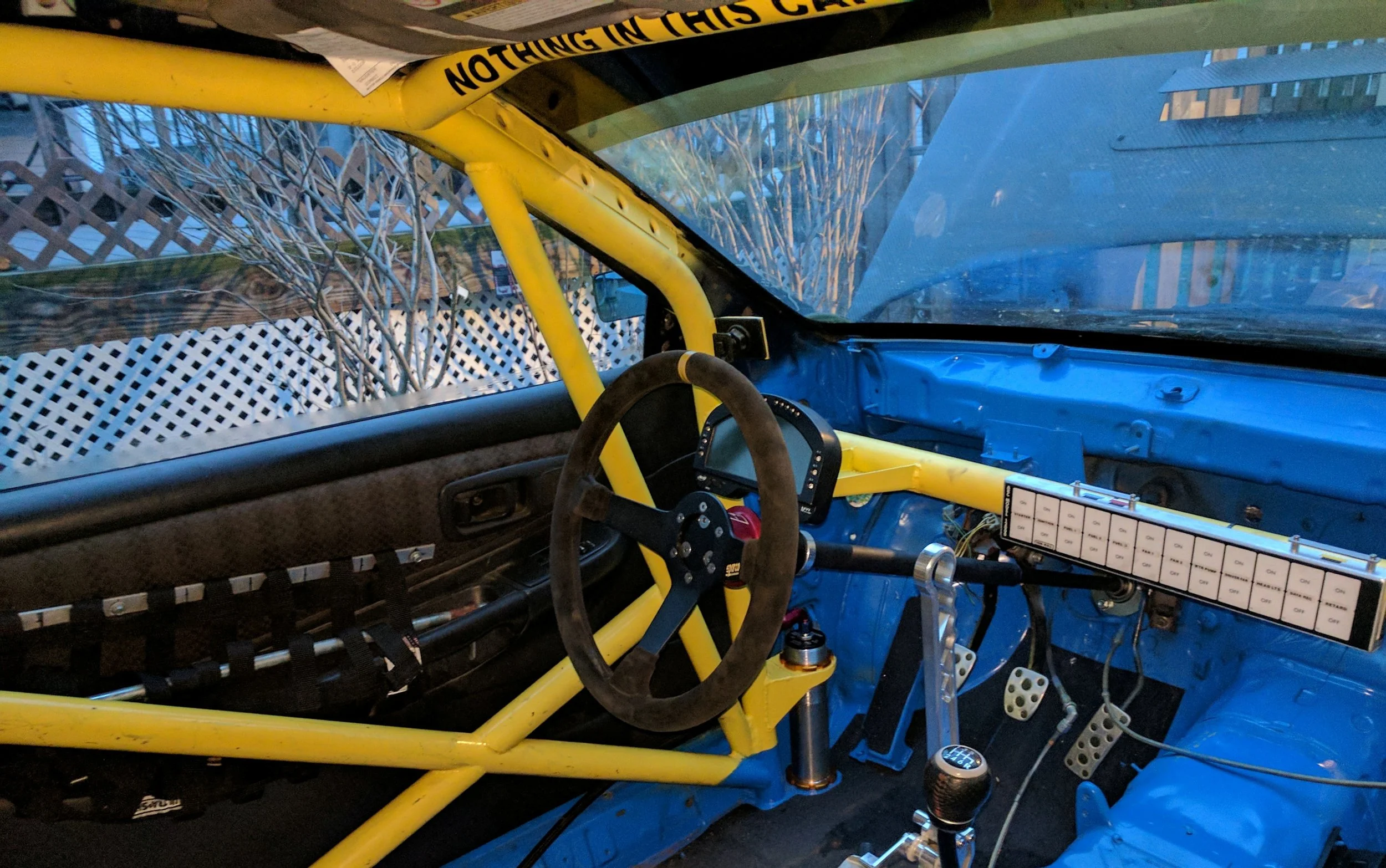Cage/Airjacks finished, Steering Column mounted on new dashbar mount, and some electronics mocked up.
