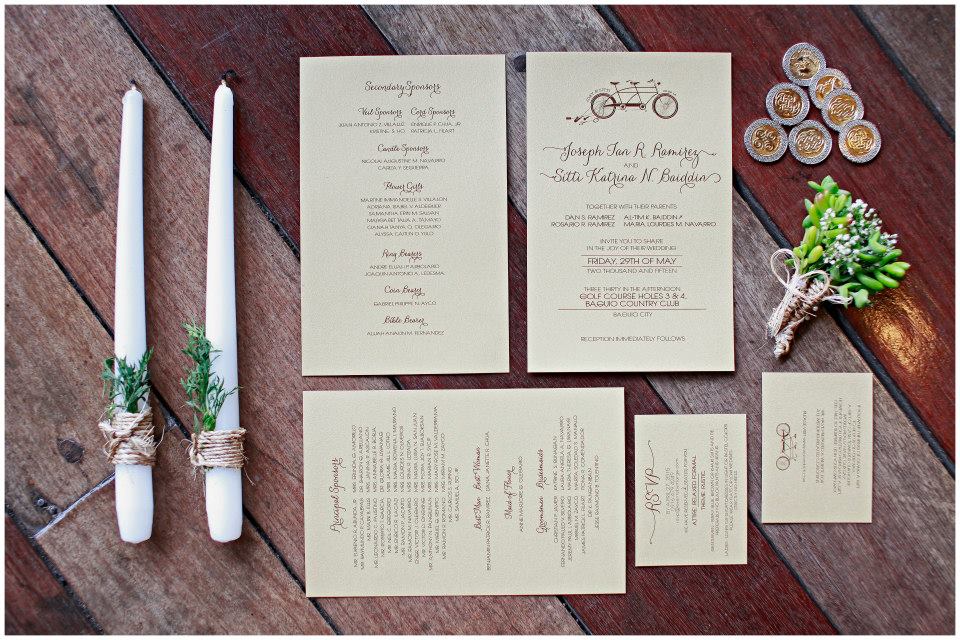 Julienne Styling suggested that we tie our invitations up with abaca yarn and eucalyptus leaves - all our invites smelled so good. <3