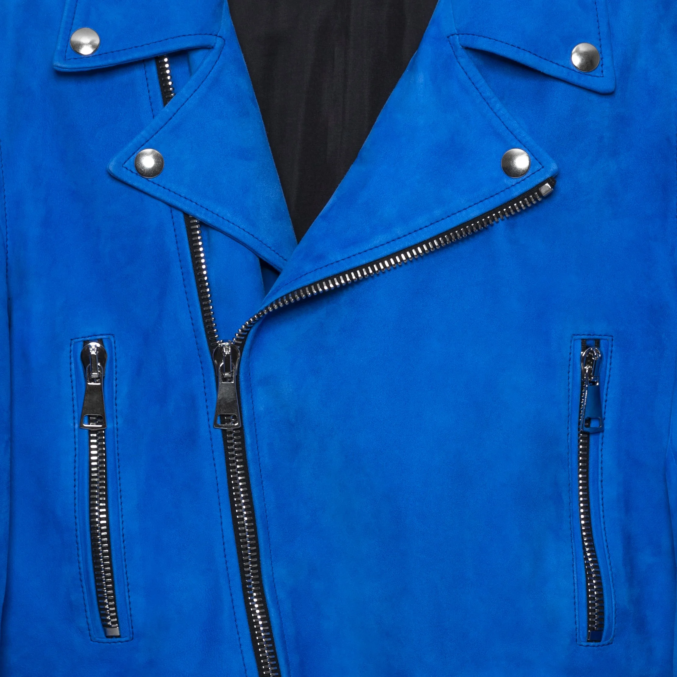 Close-up of a blue leather jacket with silver zippers and buttons.