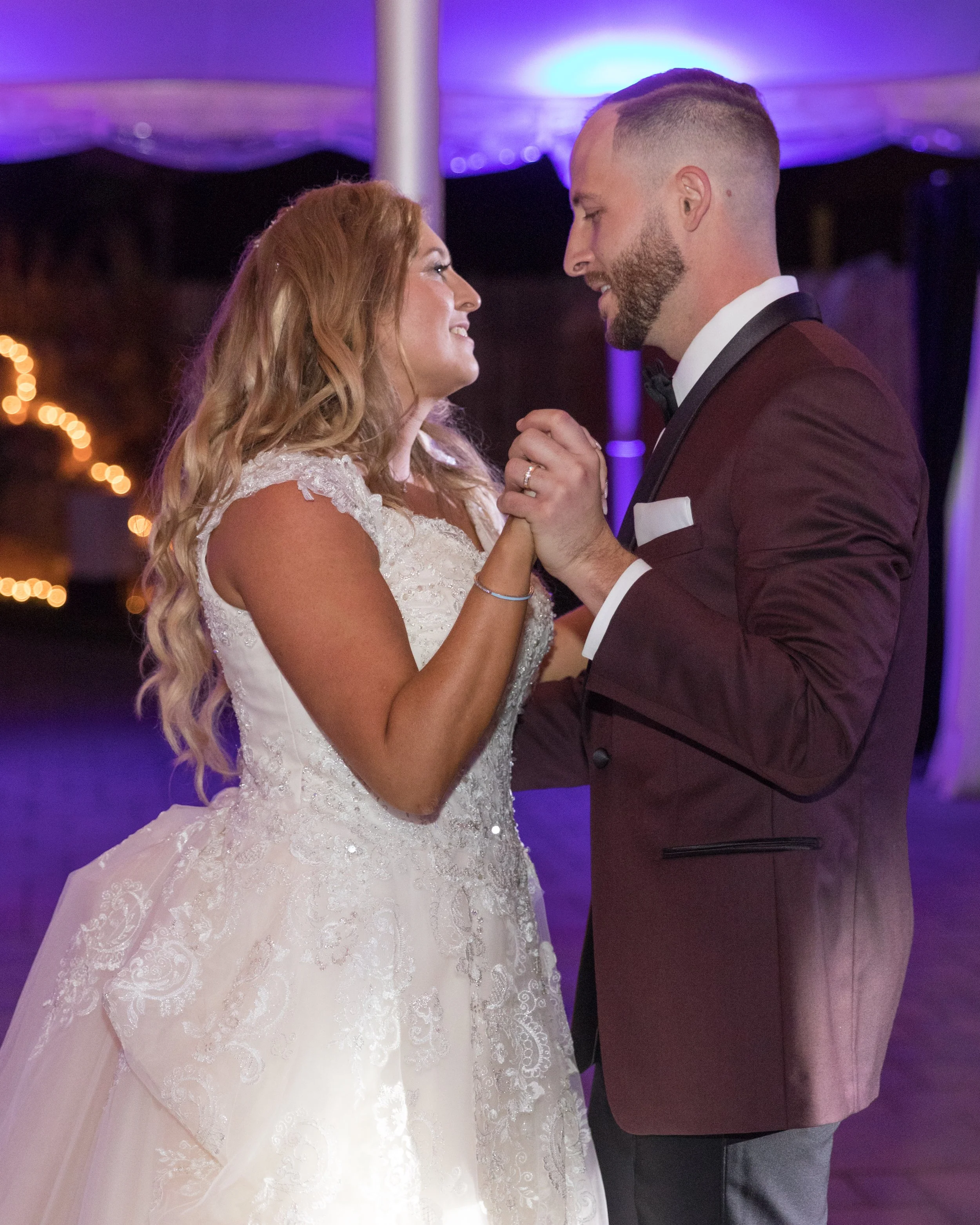 Bride and groom dancing at their wedding reception.