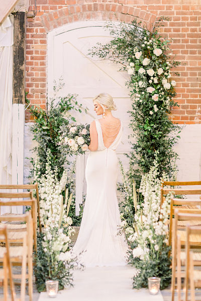 Wedding arch by Petal and Wild for the Railway Barn Essex_opt.jpg