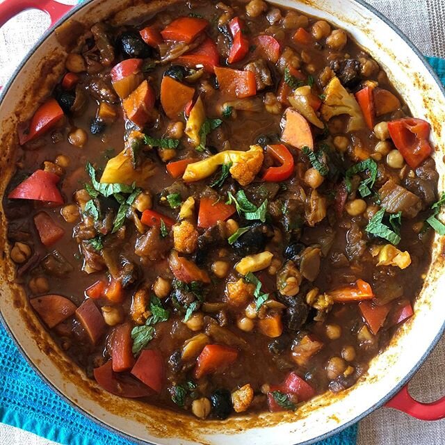 Moroccan spiced eggplant,chickpea, vegetable stew. The eggplant is cooked until positively melting into the base...bright crisp veggies added with a fistful of mint. Cured olives and lemon. Yum! #spices #eggplant #personalchef #dinner #vegan #chickpe