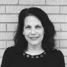 SUZY SUKER Director of Administration