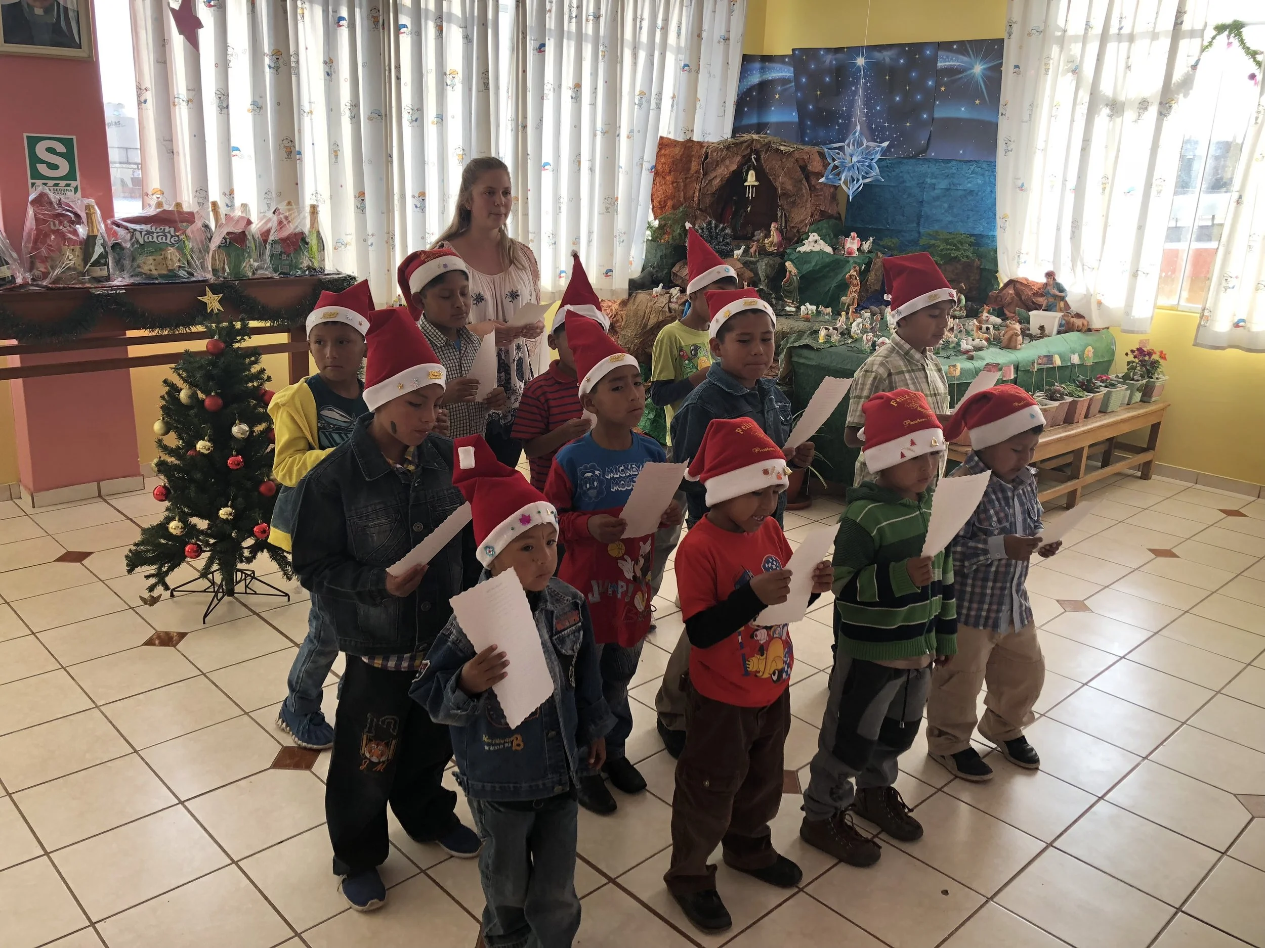 The younger children performing at the Children's home