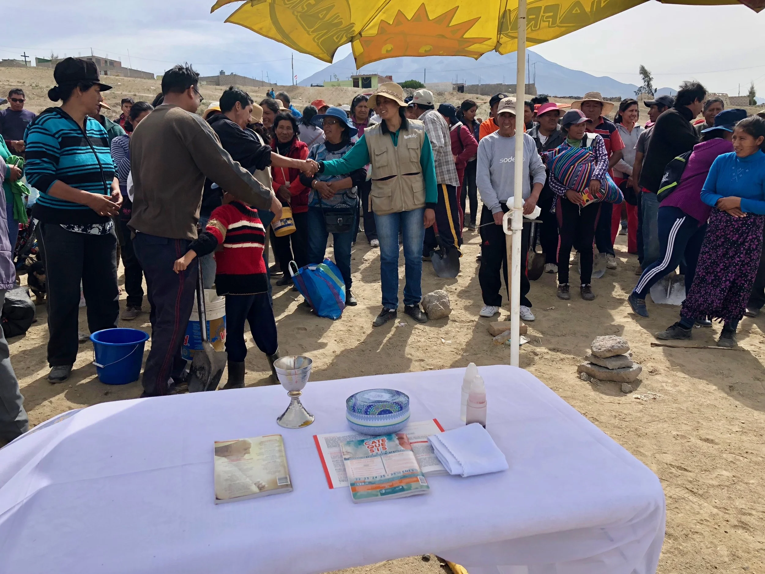 Celebrating the Eucharist after the community work at "Los Pioneros" settlement