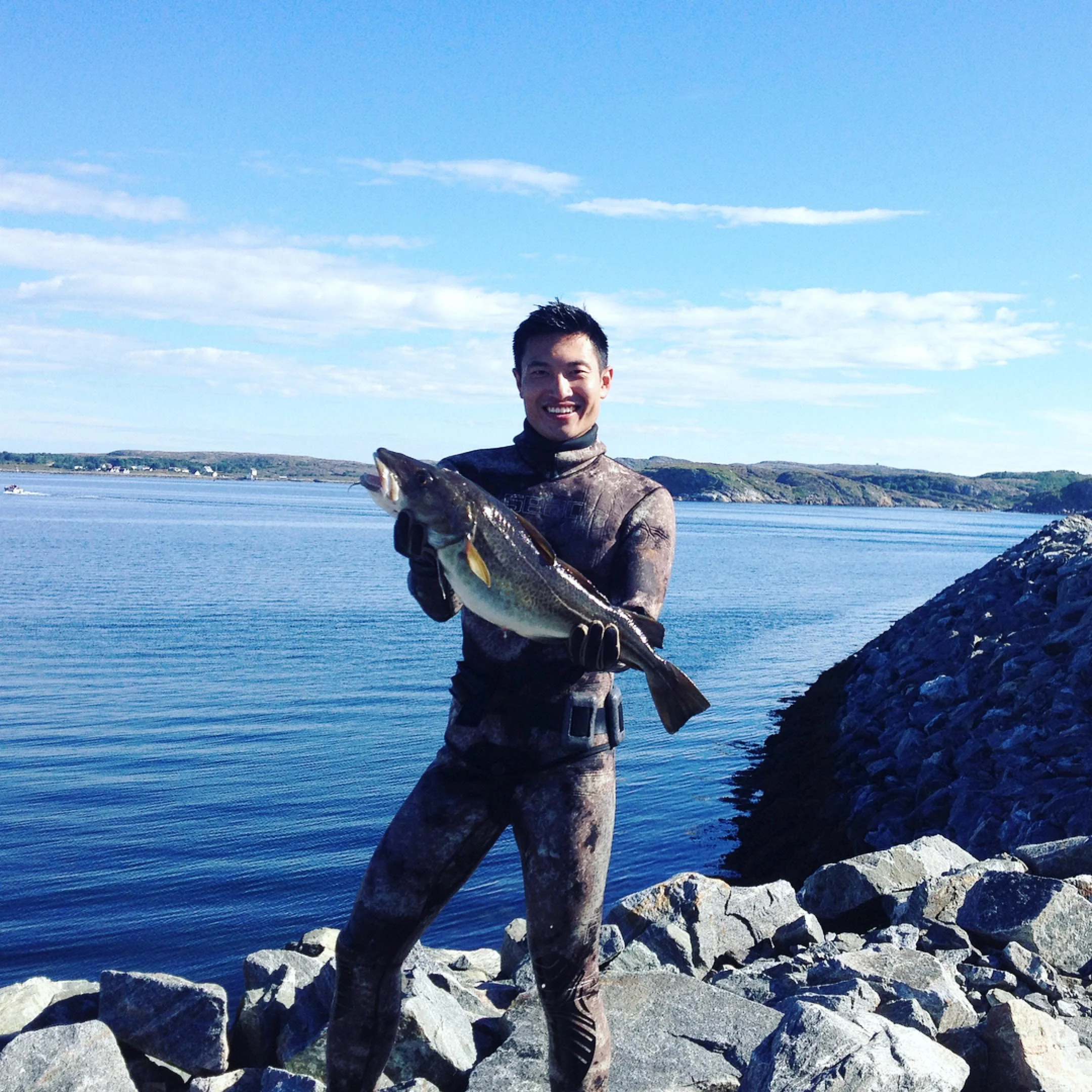 Adrian with the Norwegian cod in question, photo courtesy of Adrian Wong.
