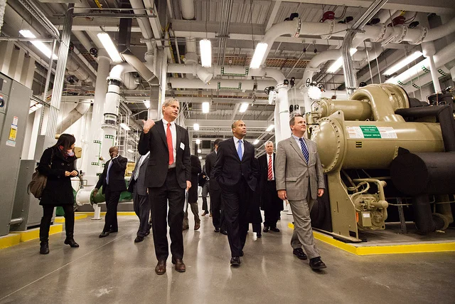 Governor Patrick, center front, tours the computing facility after the ribbon- cutting
