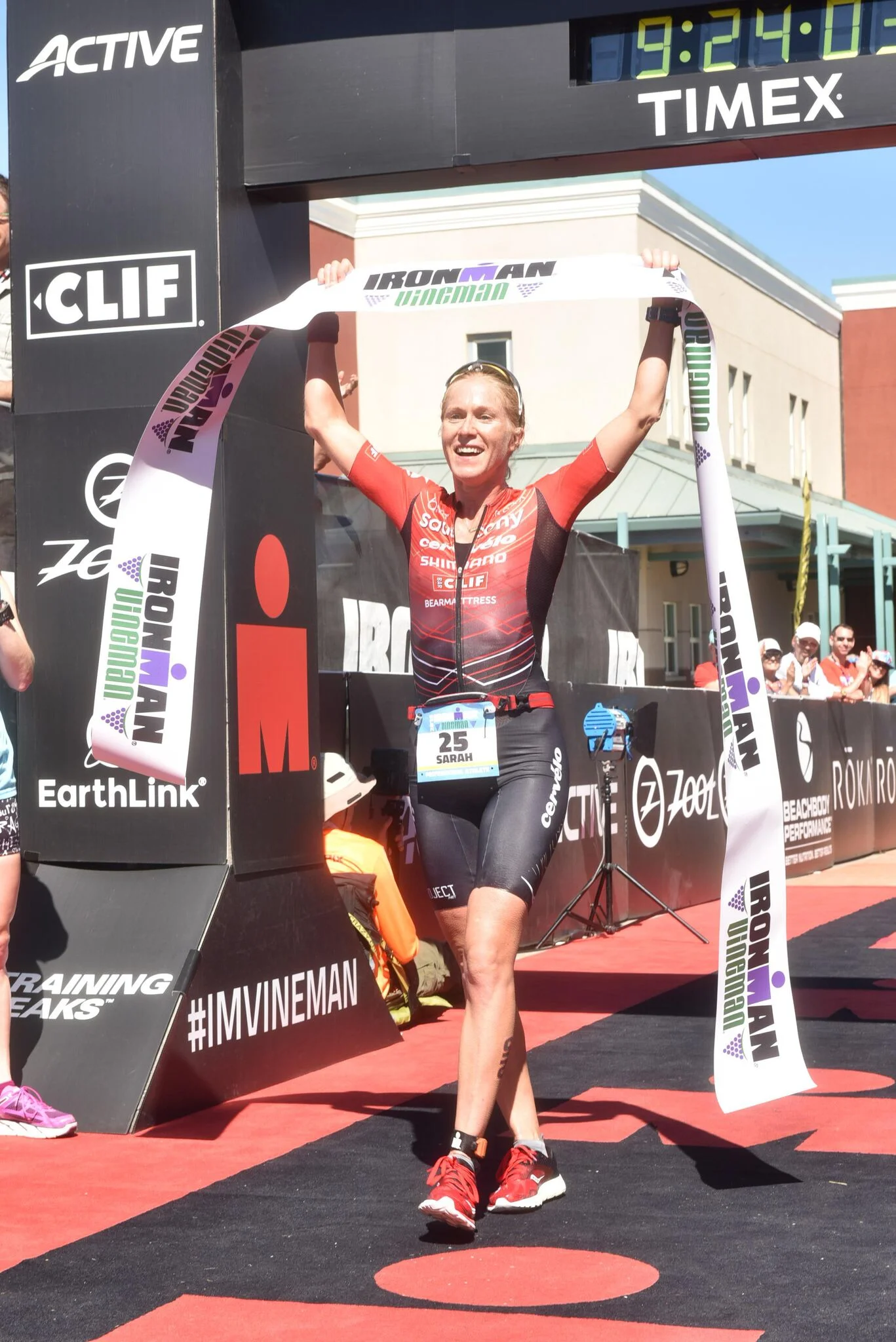 Sarah Piampiano crossing the line to take victory in a course record time at IRONMAN Vineman, 2016.