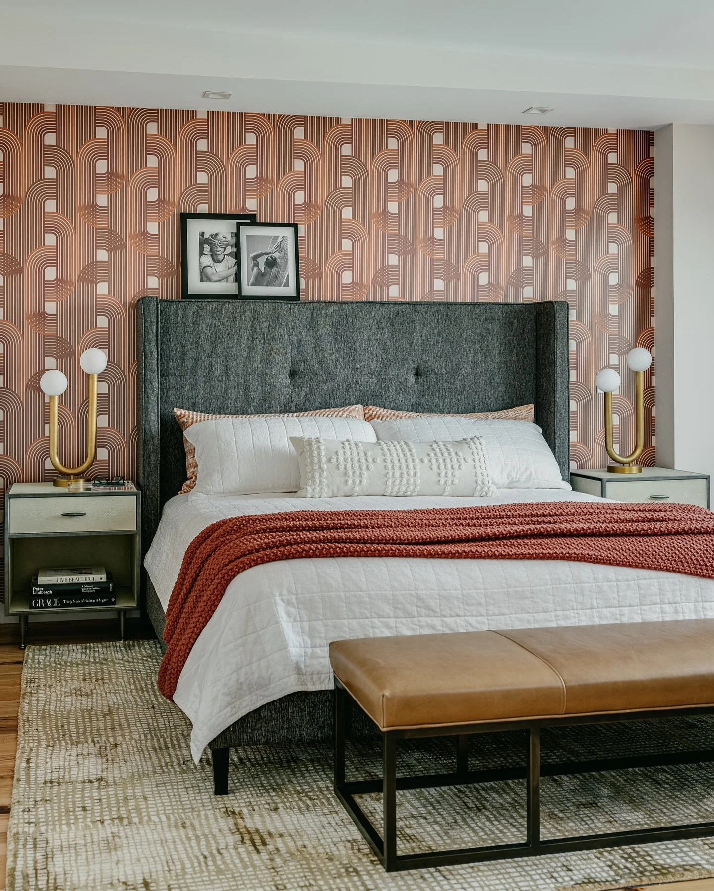 Bedrooms deserve as much personality as the spaces we show to the world.

In this historic North Beach home, we balanced bold pattern and quiet texture &mdash; a statement wallpaper paired with tailored upholstery, layered linens, and brass accents. 