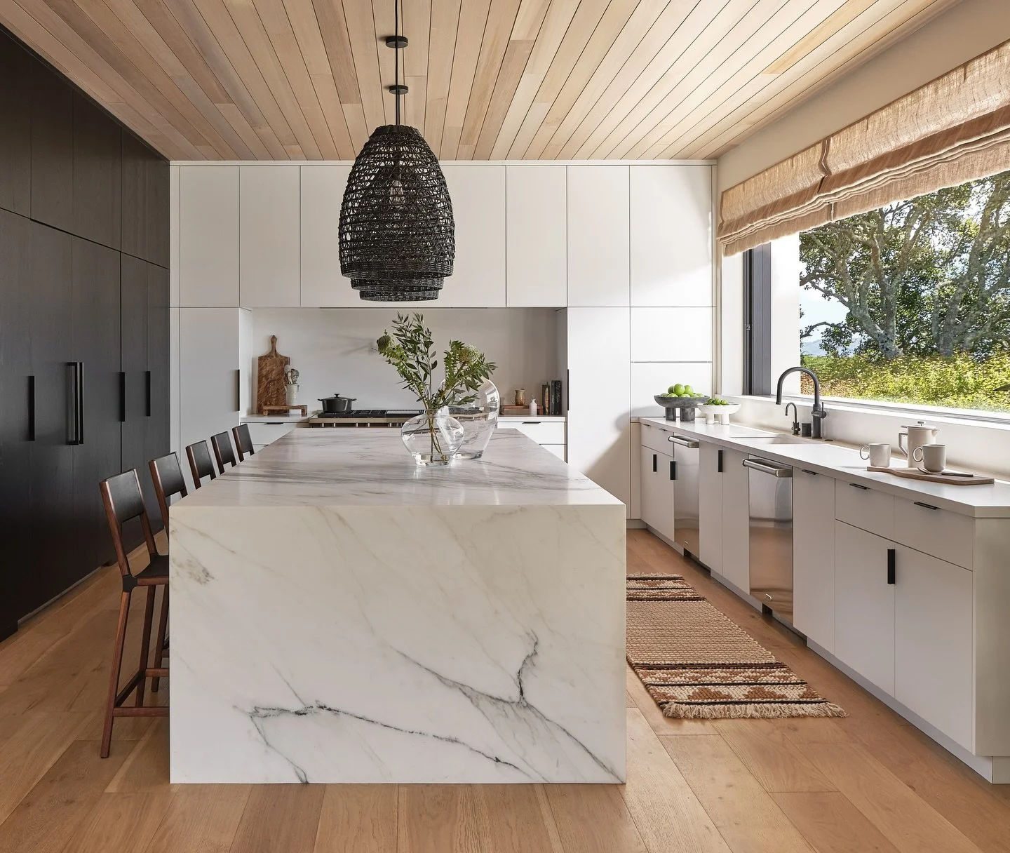 A kitchen designed to work quietly in the background of daily life.

Clean lines, warm materials, and a layout that prioritizes flow over excess &mdash; allowing light, proportion, and texture to do the work. This space was designed to feel grounded,