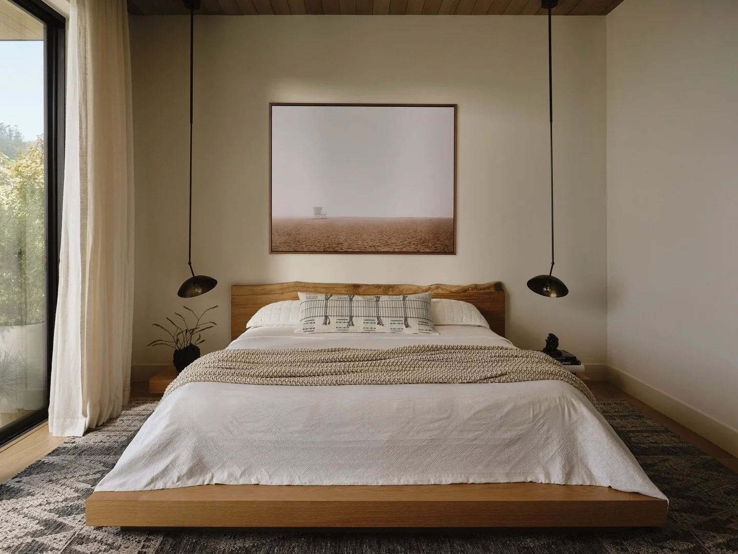 Within our Sausalito custom home, the primary suite was designed to feel grounded and restorative.

This space was designed to feel grounded, quiet, and restorative &mdash; where architecture and interior move seamlessly together. Warm wood tones, la