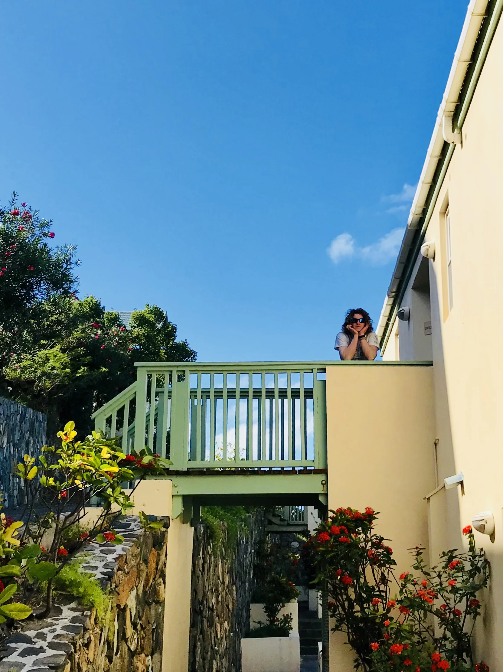 Zack at the door of our West End Villa, our base of operations pre-boat board.