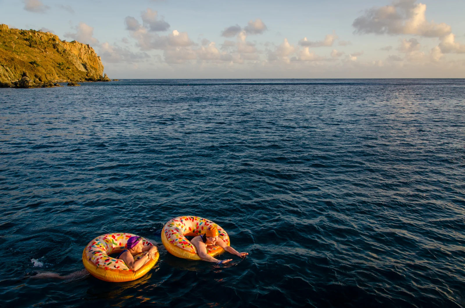 Tammy and Deb enjoy some floating in the lee of Cooper Island, our anchorage for the night.