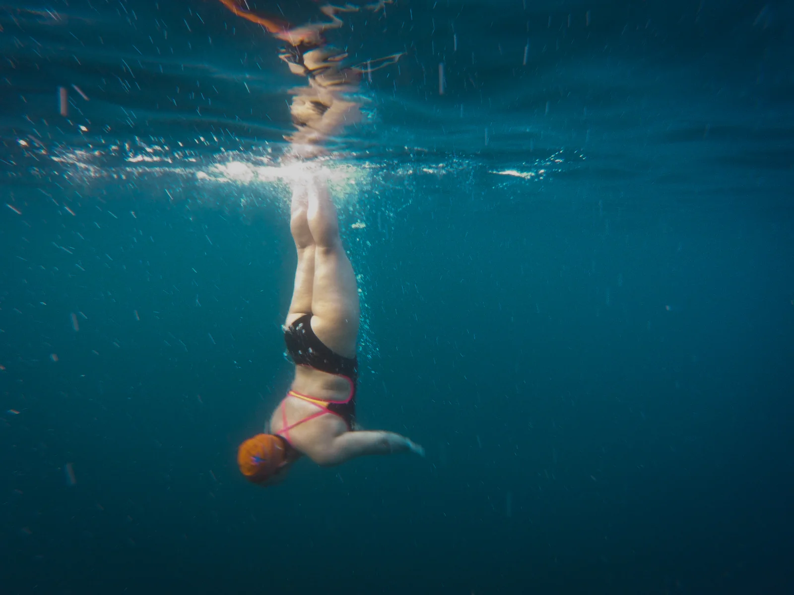 Amy just won’t get out of the water. Flipping and spinning and taking it all in. She just won’t get out.