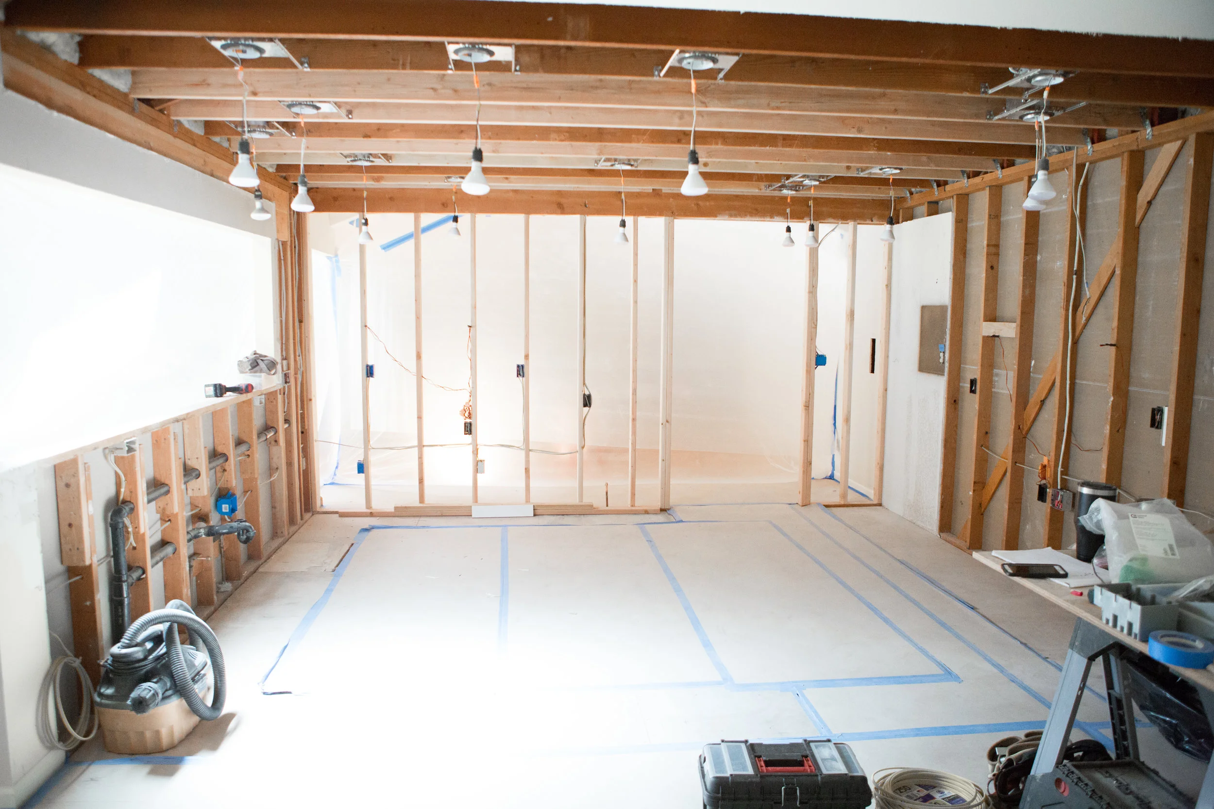 The EXISTING SINK WALL is ON THE LEFT, the REFRigerator WALL IN THE BACKGROUND, with the STOVE TOP WALL TO THE RIGHT.