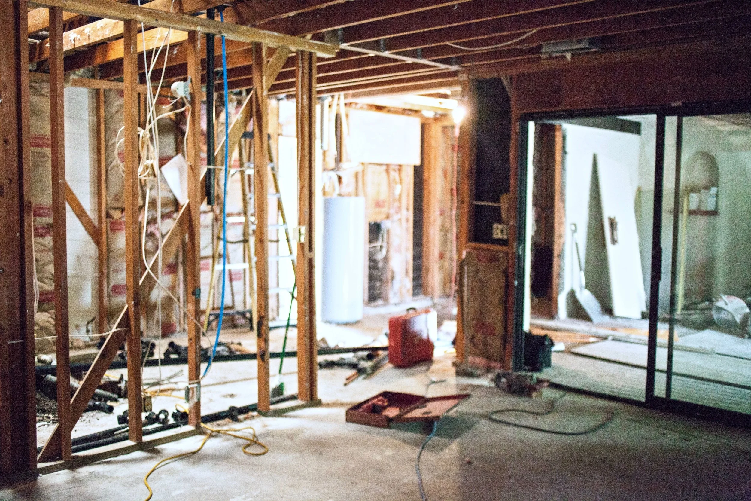 WHAT ARE YOU LOOKING AT? 1. FOREGROUND : MASTER BEDROOM 2. TO THE LEFT : OLD BATHROOM SPACE WITH TOILET, SHOWER & TUB ROOM REMOVED 3. STRAIGHT AHEAD : OLD WATER HEATER CLOSET THAT WILL BECOME PART OF THE MASTER BATHROOM 4. RIGHT & FAR RIGHT: PART OF OLD SAUNA THAT WILL BECOME NEW CLOSET