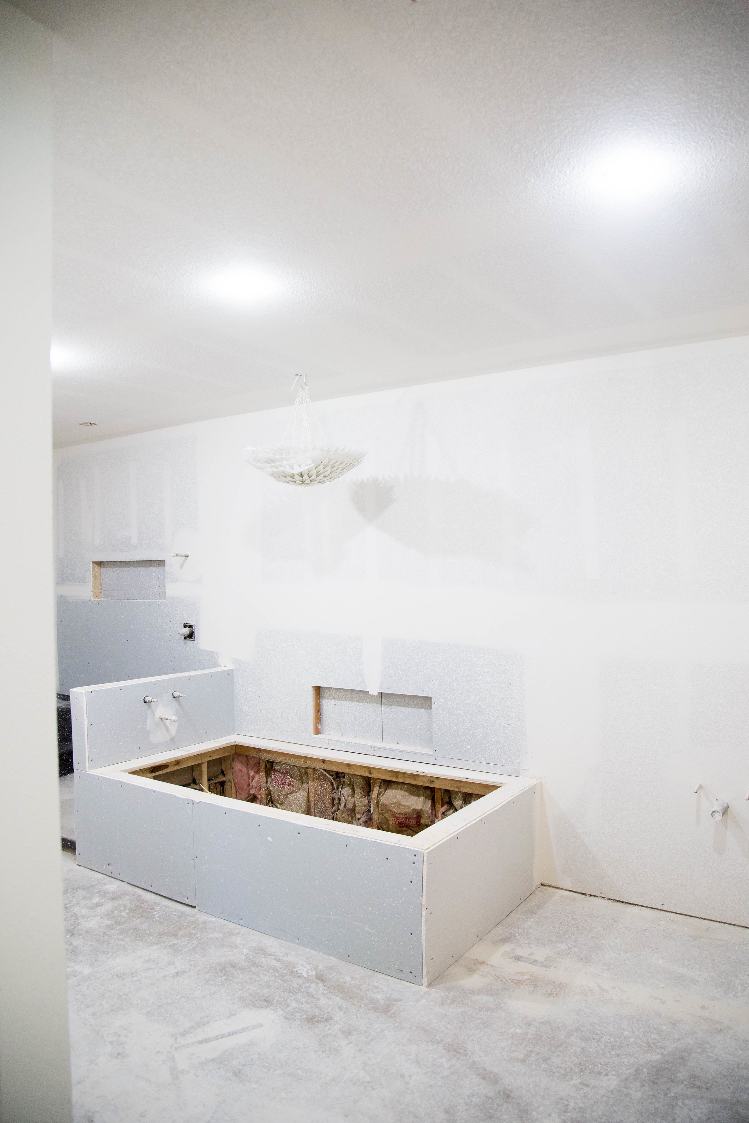 looking past the tub towards the shower.