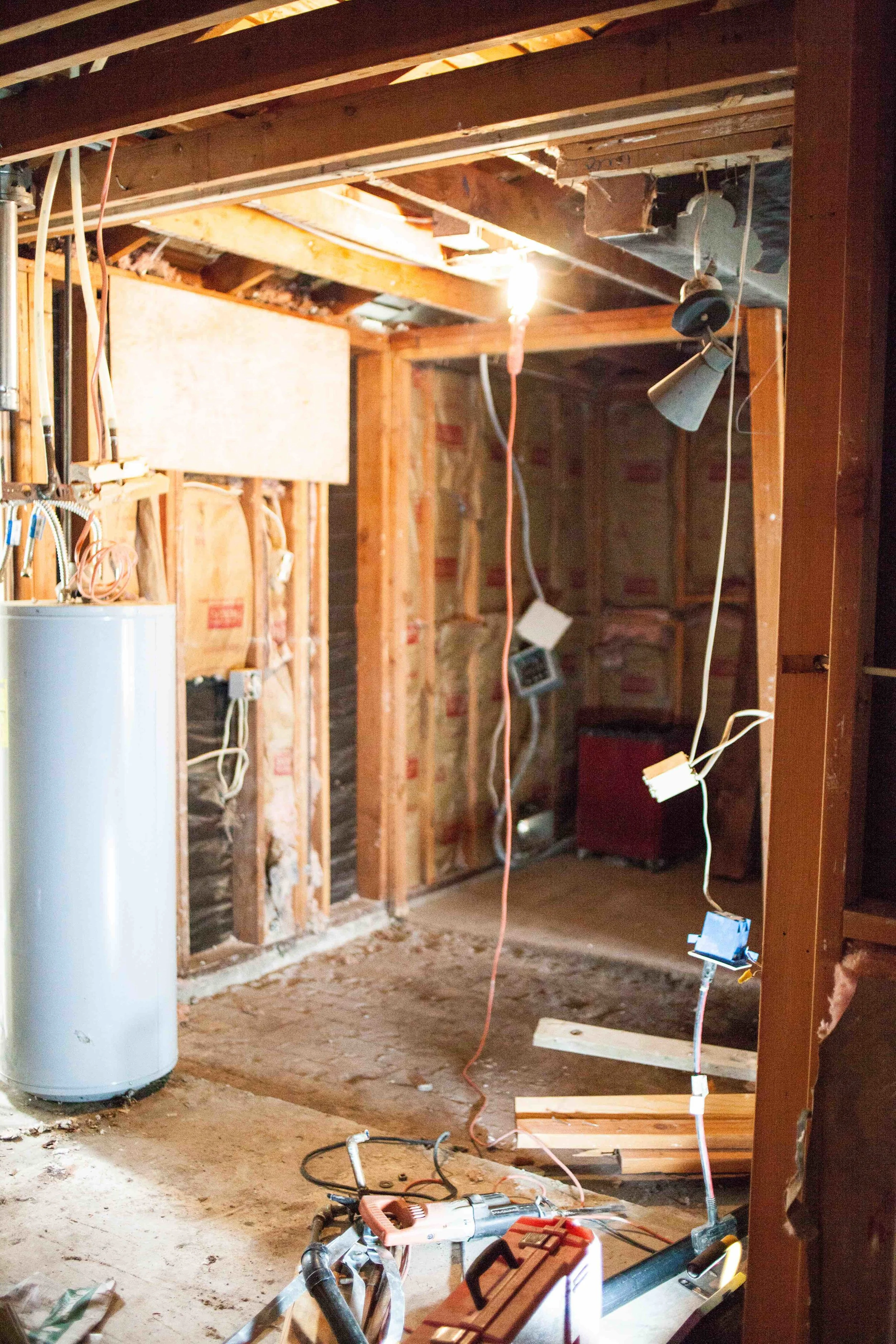 WHAT ARE YOU LOOKING AT? 1. WATER HEATER : WILL BE REPLACED WITH A TANKLESS THAT WILL BE MOUNTED ON THE EXTERIOR OF THE HOUSE AND THE GAINED SQUARE FOOTAGE WILL BECOME PART OF THE BATHROOM 2. BACKGROUND: NEW CLOSET SPACE THAT WAS ONCE PART OF THE SAUNA