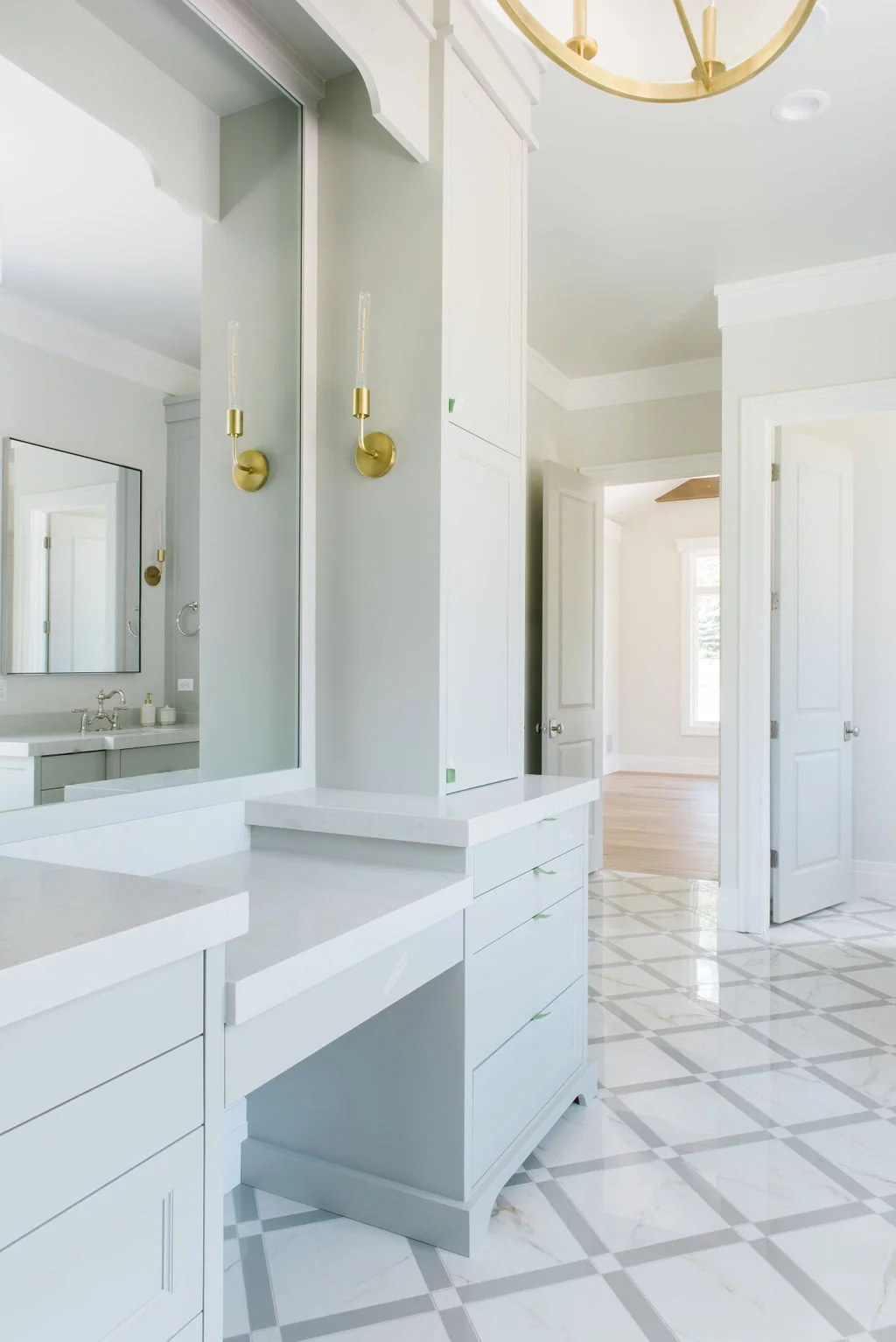 MASTER BATH MAKE-UP DESK AND LINEN CABINETS
