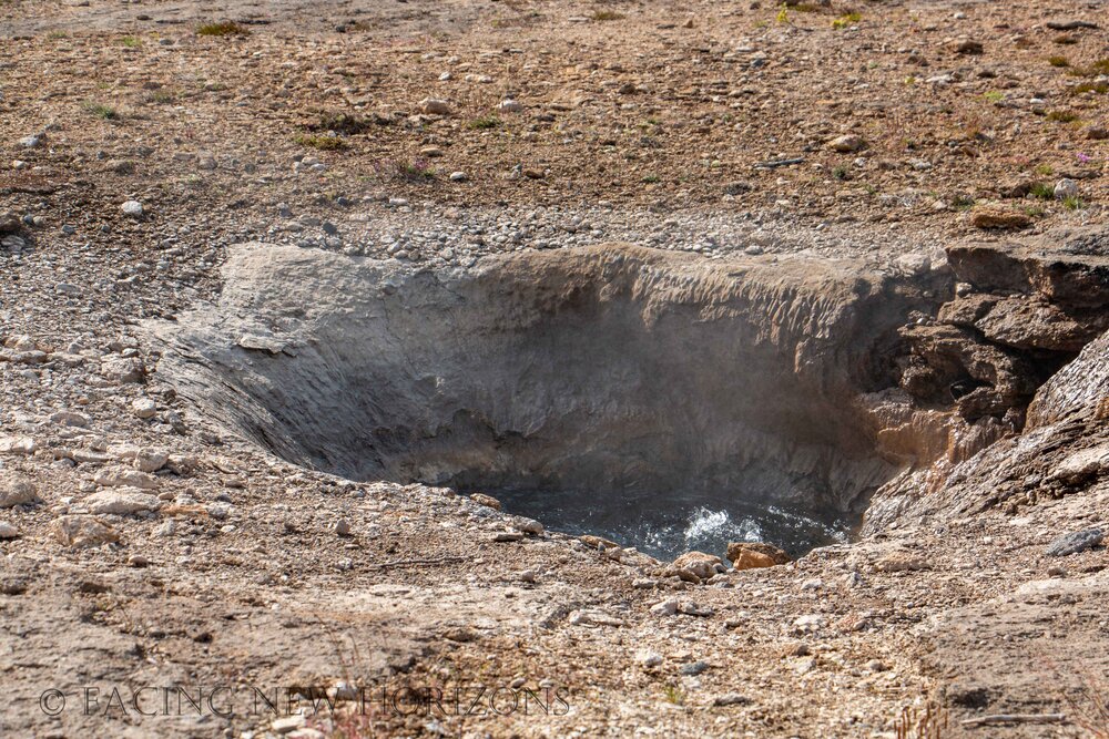  Bubbling pools of water. Not enough pressure to shoot up as a geyser, but cool to see what looks like a pot of boiling water out in a field 