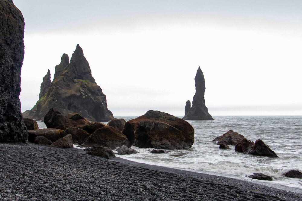  The dark sand and dark rock are made more ominous by the gray skies, pounding seas, and the mist that hangs in the air. Even the name Reynisdrangar sounds dark and imposing… 