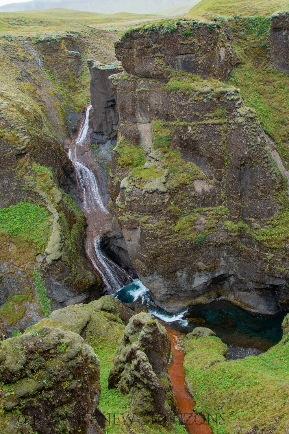  Water flowing into the base of Fjaðrárgljúfur  