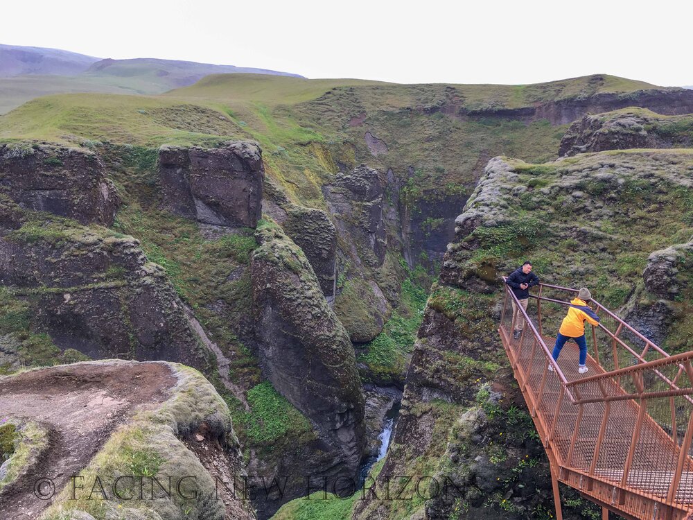  Fjaðrárgljúfur lookout platform hanging over the canyon. The lady in yellow was TERRIFIED! 