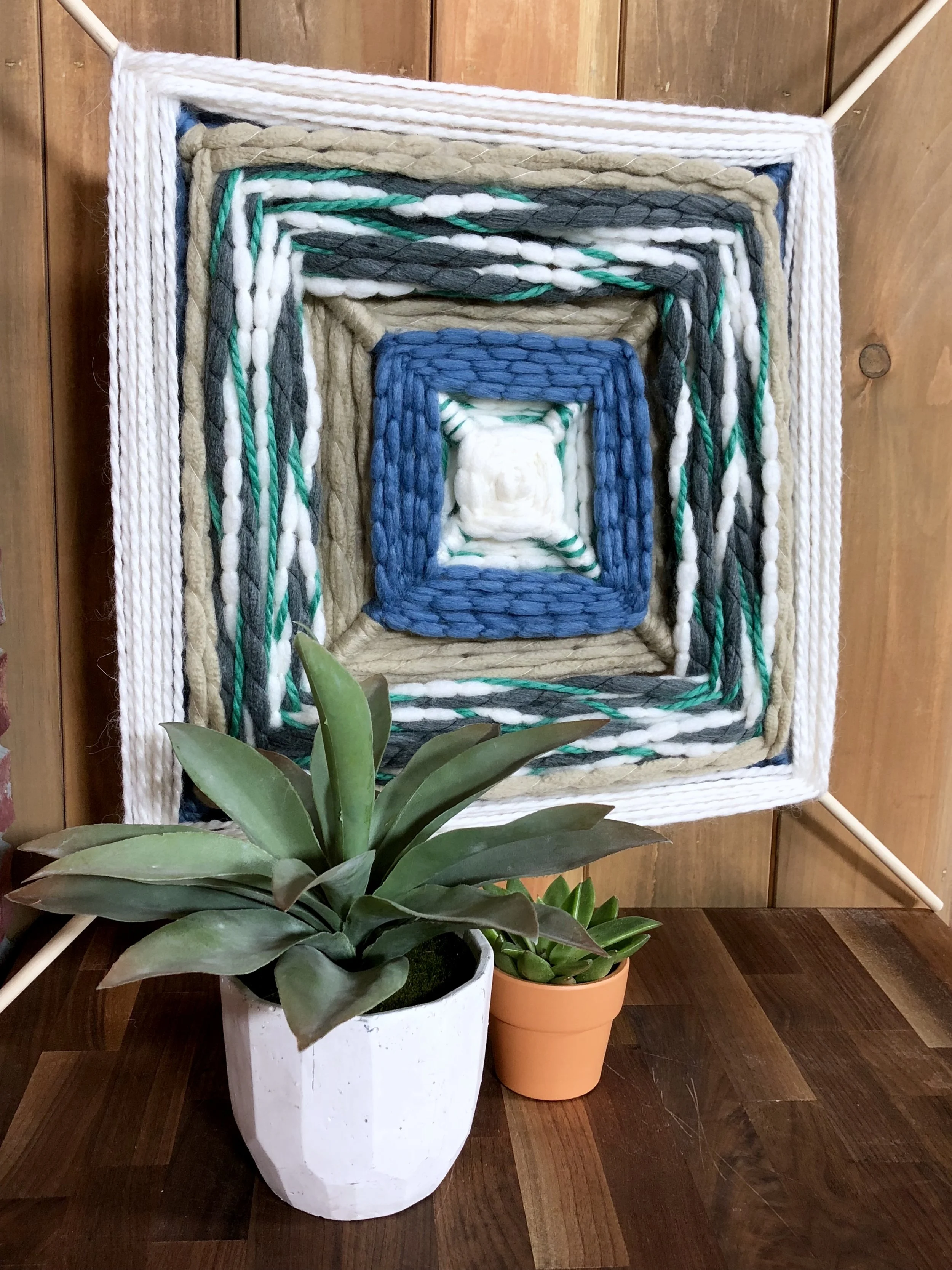 Throwback Summer Camp Crafts for Adults - We were inspired by old camp patches and got crafty with felt, made a larger than life God's eye with chunky yarn and turned a loopers finger weave into a basket up do! 
