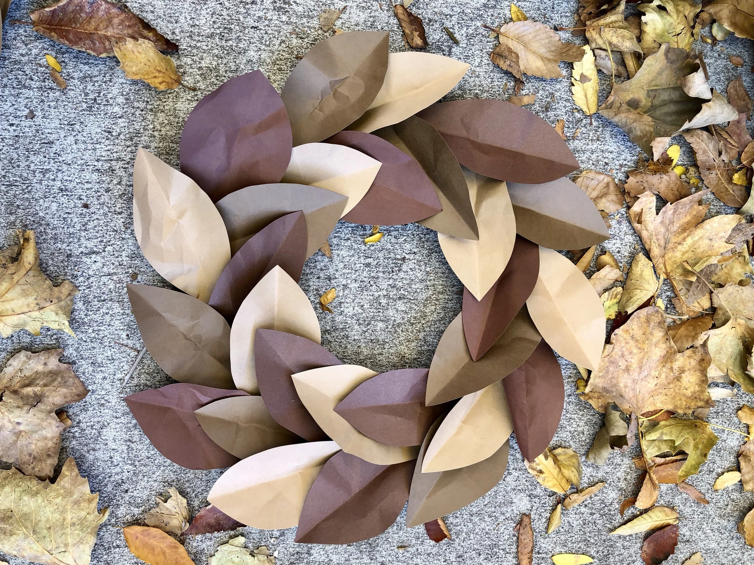 Easy DIY Paper Magnolia Wreath using cardstock and foam board #paper #papercrafts #papercraftdiys #rachaelray #fallwreath #fall #falldiy #autumn #autumndiy #magnoliawreath #paperwreath #falldecor #falldecorations #leaves #diyleaves #paperleaves #wreathring #wreath #autumnwreath #dollarstore #dollarstorecrafts #easycrafts