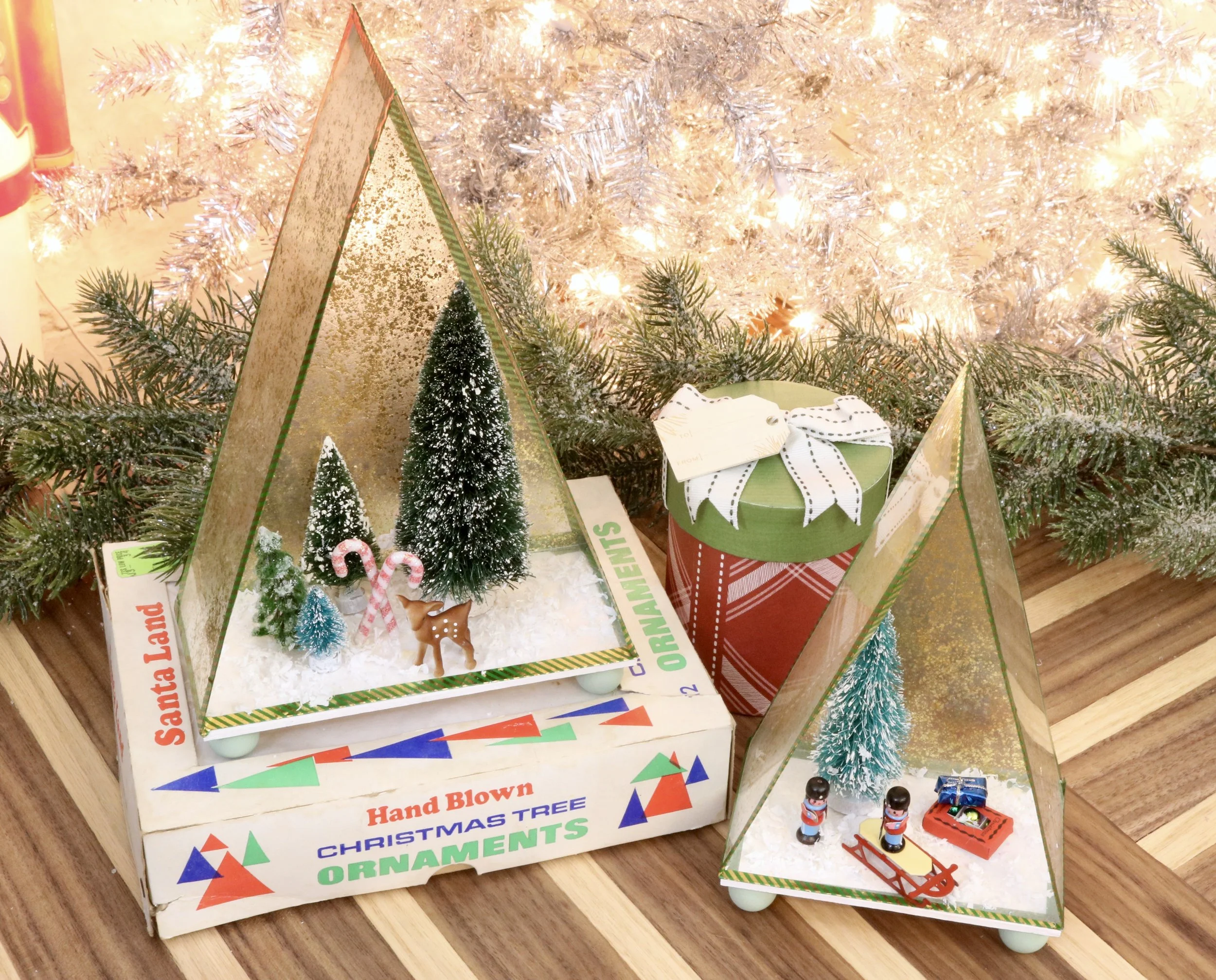 DIY Vintage Inspired Christmas Shadow Box using Mod Podge Mega Glitter and Shrinky Dinks paper. #vintgechristmas #Shrinkydinks #bottlebrushtrees #modpodge #plaidcrafts #christmasminiatures #christmasvillage #christmasdecorations #christmascrafts