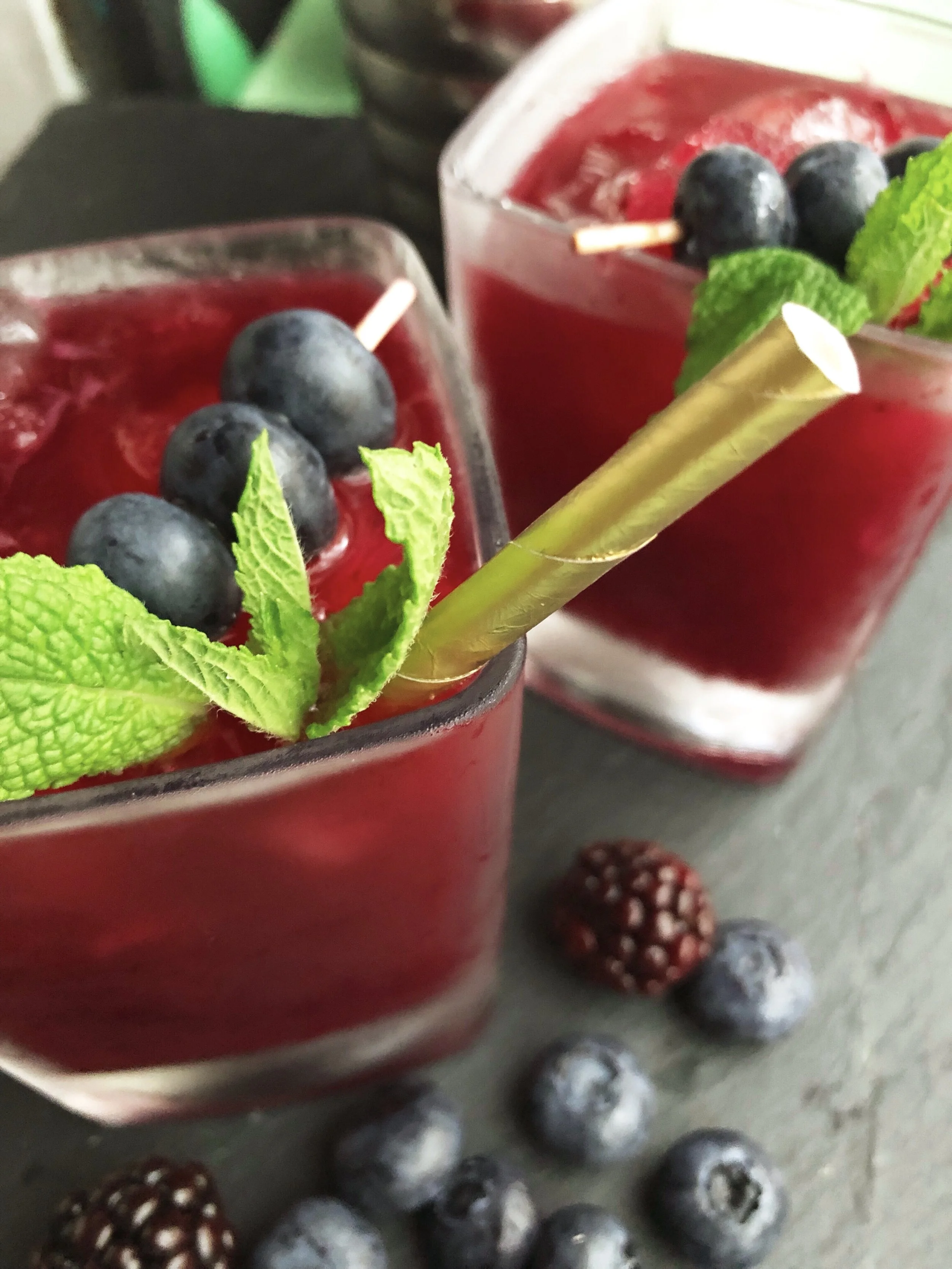 Bring your summer cocktails to the next level with this blackberry, blueberry mint make-ahead simple syrup recipe. #cocktails #simplesyrup #blueberries #blackberries #cocktailrecipe #summerdrinks #blueberrycocktail #blackberrycocktail #summercocktail #easycocktail #makeaheadcocktails #summerlemonade #whiskey #whiskeydrink #whiskeycocktail #whiskeylemonade #wishfarms