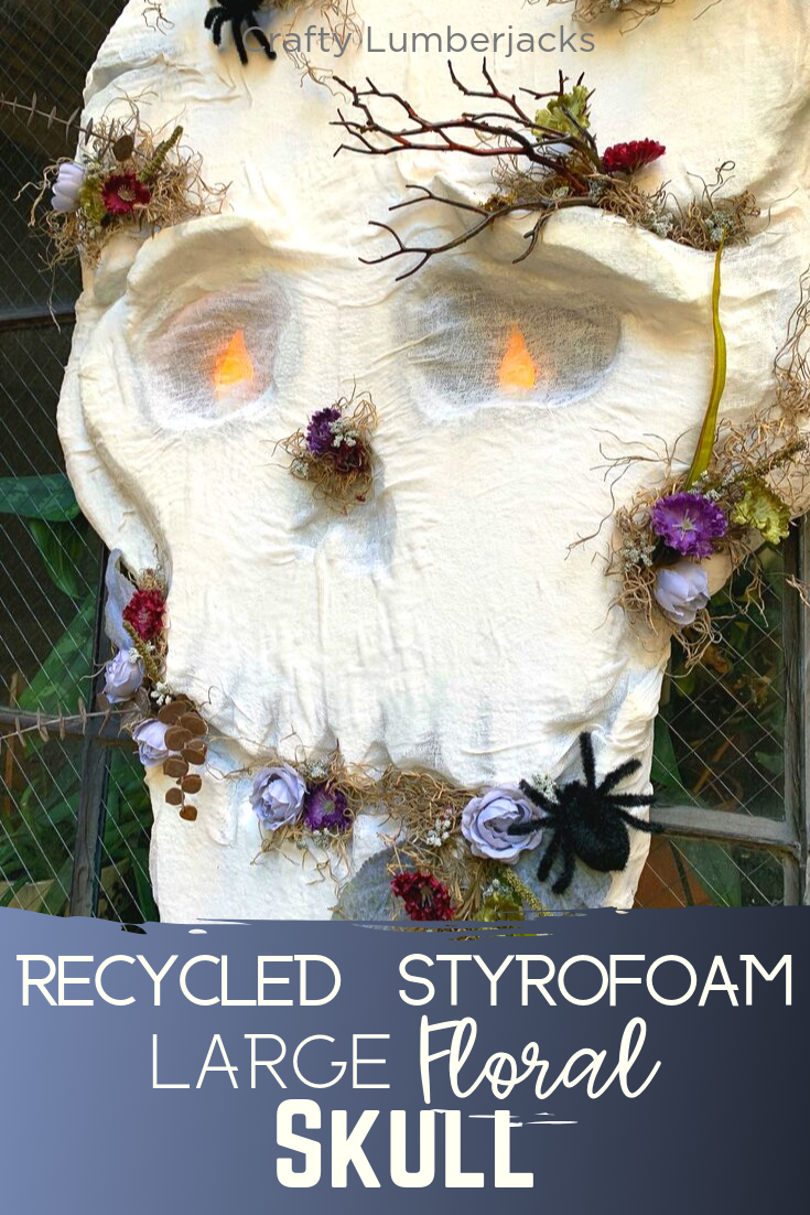 Large Hanging Halloween Floral Skull DIY - Create a larger than life one of a kind Halloweendecoration using upcylced materials! #vintagehalloween #halloweendiy #hauntedhouse #creepy #spooky #upcycledcrafts #halloweendecor #booityourself #craftylumberjacks #halloweeneveryday #halloweendoordecorations #halloweenwreath