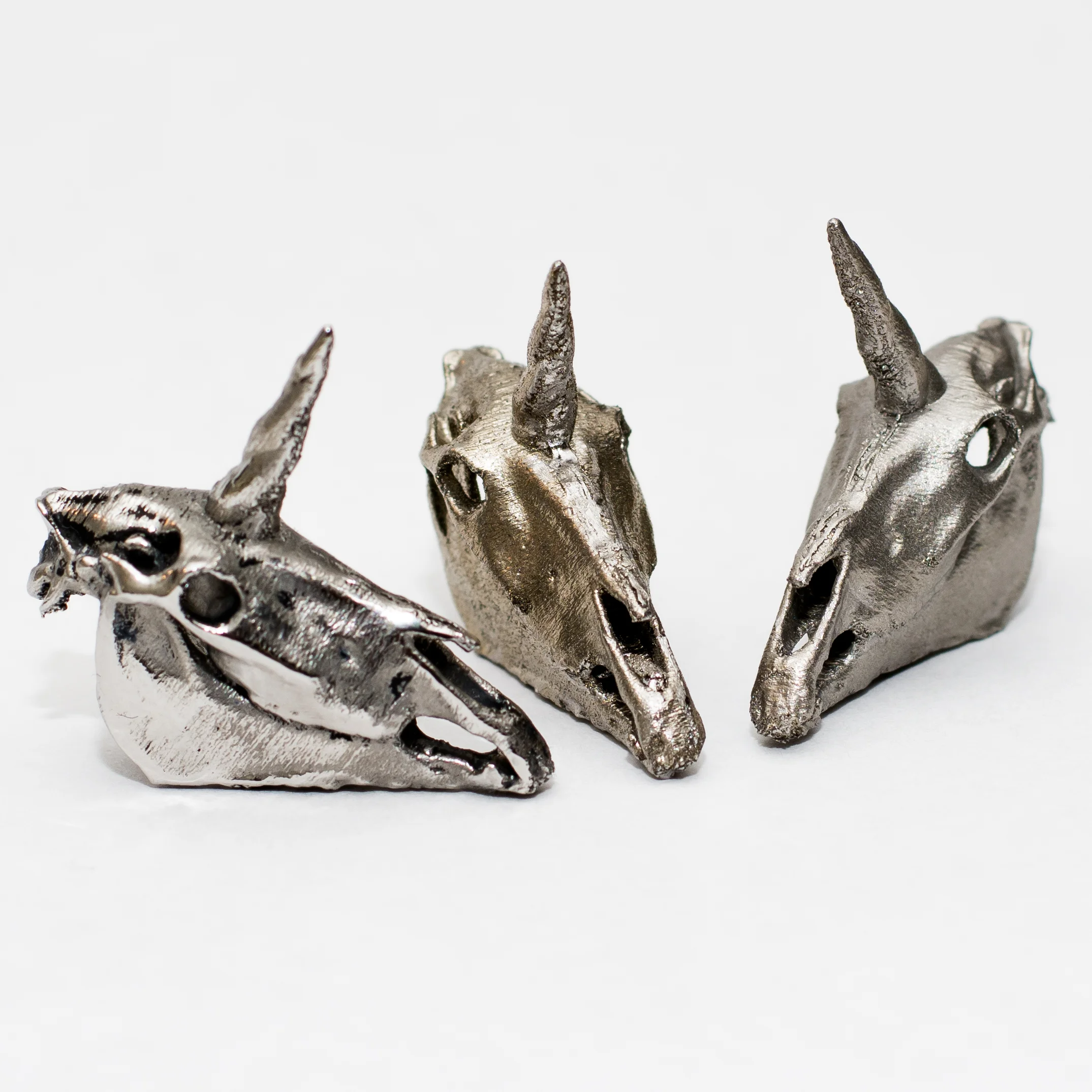 From left to right: Polished, as-built, media blasted.