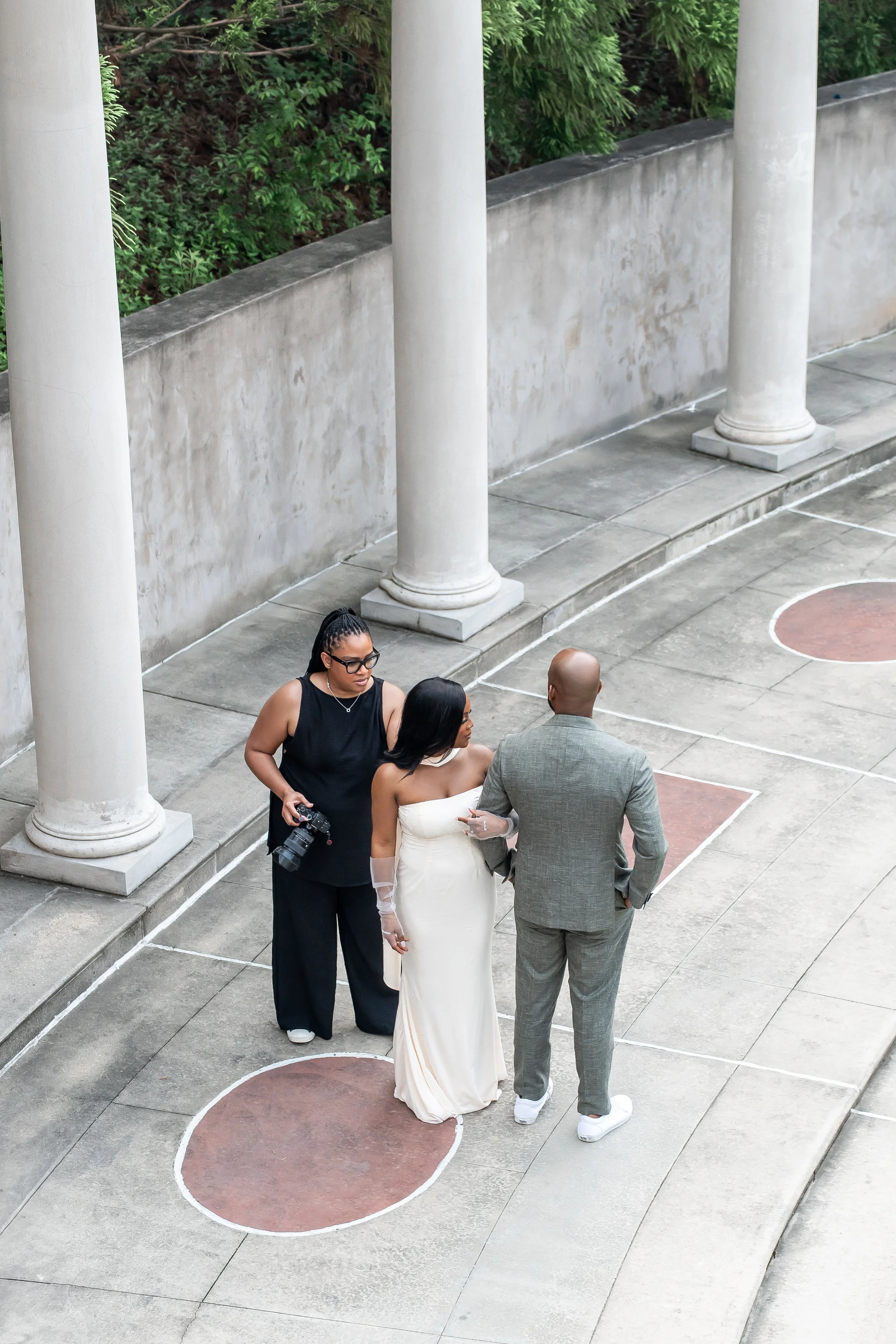 LaJoy Lewis posing a couple during their engagement session at Millennium Gate Museum in Atlanta Ga.