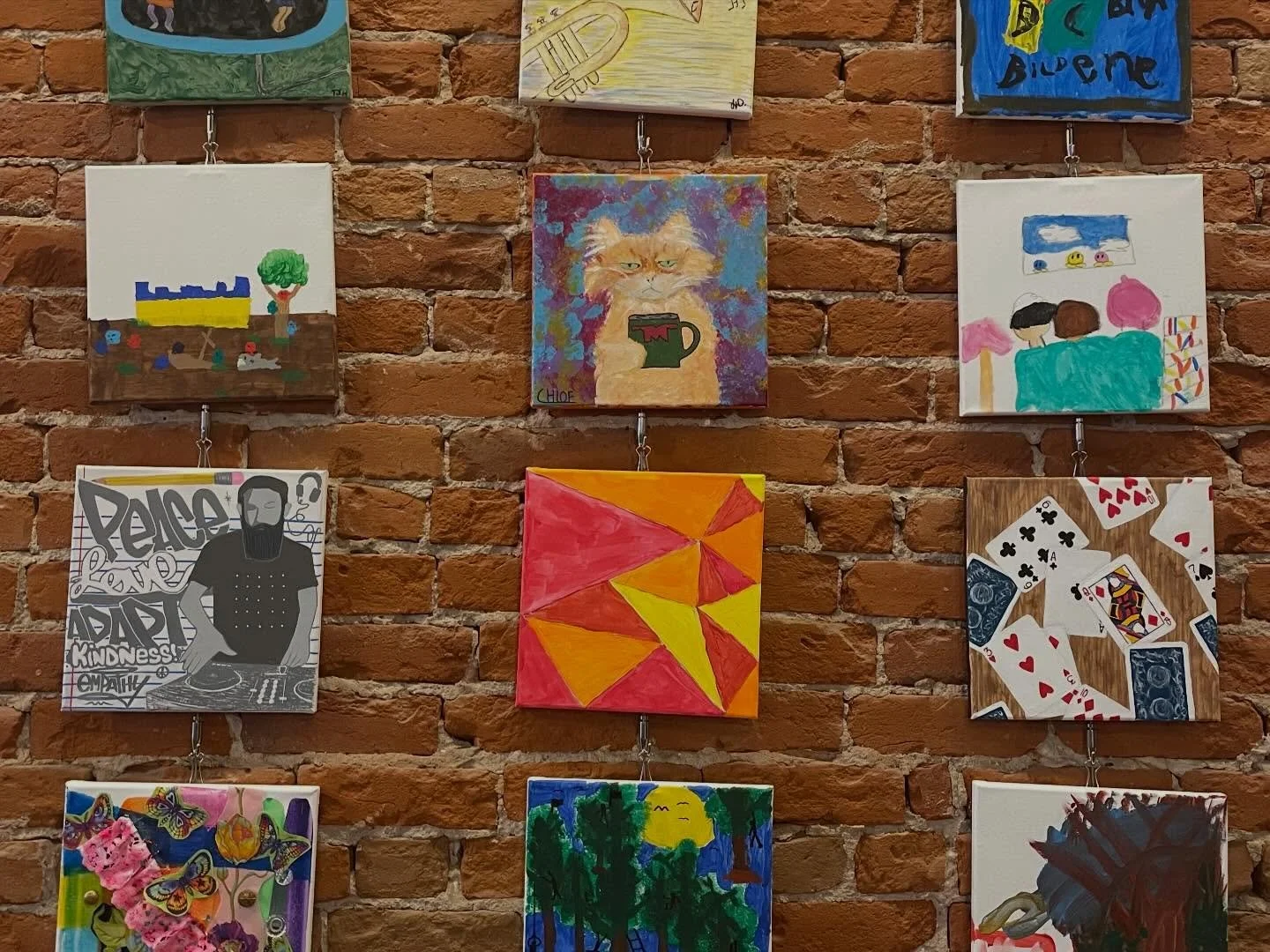 The annual @caldwellfinearts community art show is up &amp; running on the brick wall! Come &amp; see all of the beautiful pieces through the rest of this month. Thank you to all of the artists who contributed &amp; @caldwellfinearts for putting toge
