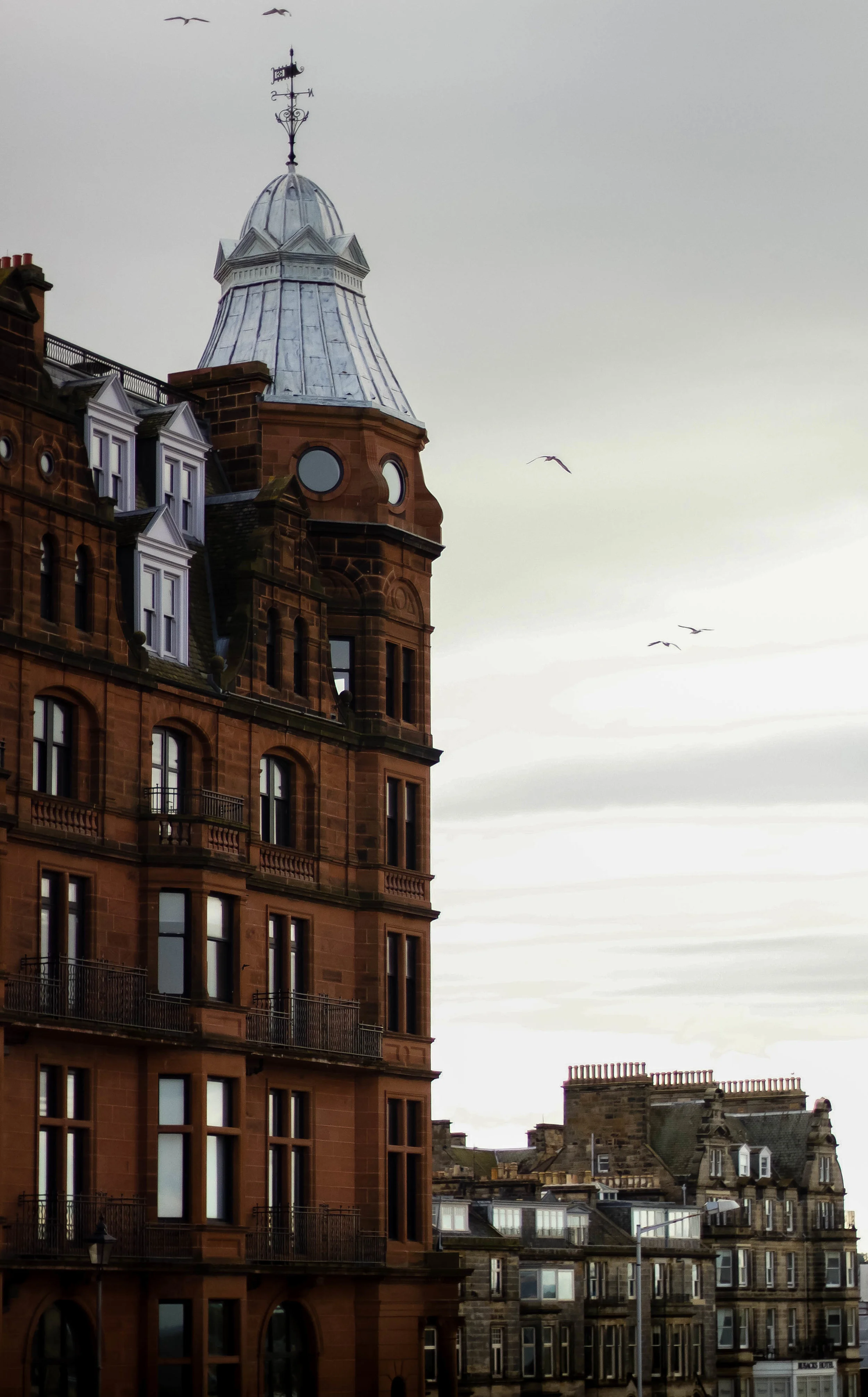 A few buildings near the golf course.
