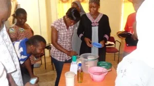 Trainees at the recent malnutrition training at the Lawra District Hospital learning how to prepare therapeutic food