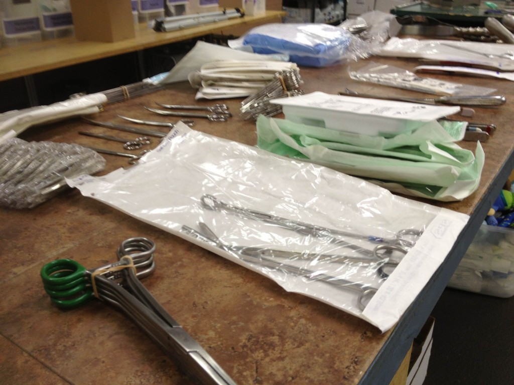 Assembling suturing and surgical kits.