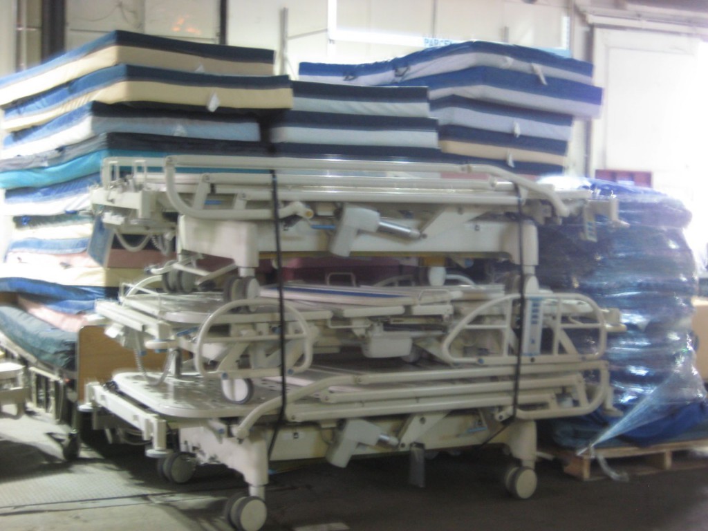 Hospital Beds Stacked for Loading