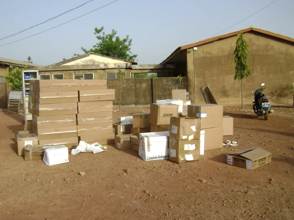 Boxes of Medical Supplies Being Unloaded