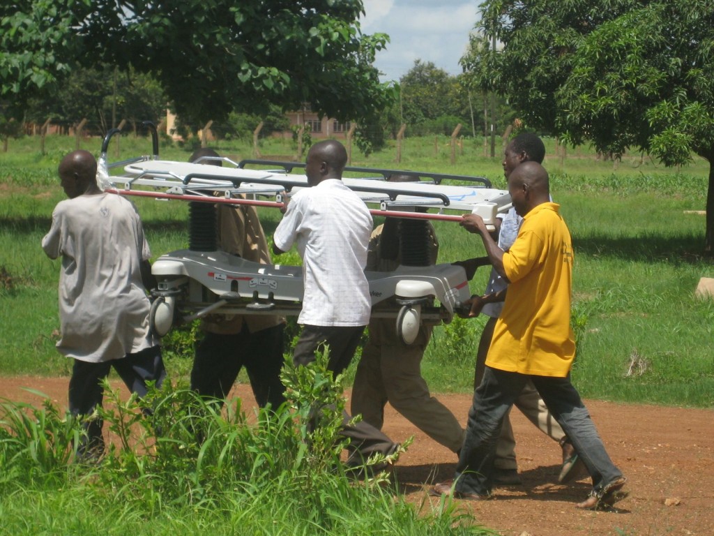 Carrying Hospital Beds into the Lawra District Hospital