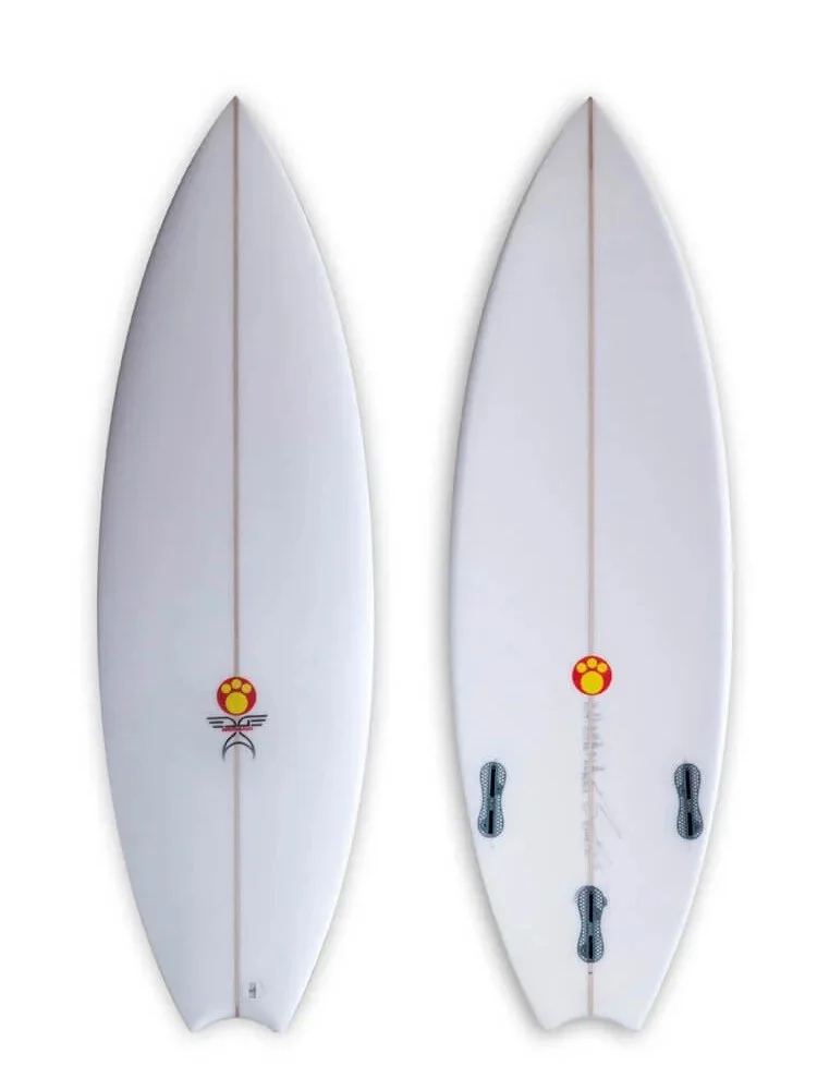 Two white surfboards standing vertically against a plain background, with a red and yellow logo near the center on each board.