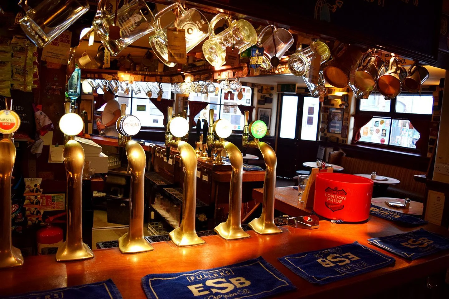 Above image; Close up view of the bar,. The smell of fresh polish for the brass taps filled the air as I took this photo.