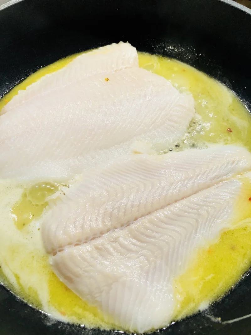 First side of fillet cooking - flip after 4-5 minutes then watch for flaking