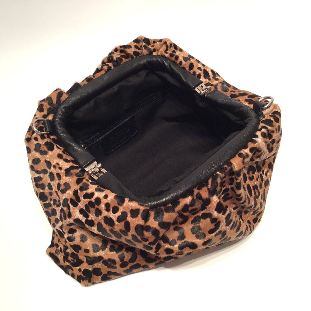 Animal Print Cowhide Maxi Clutch Bag — Forme