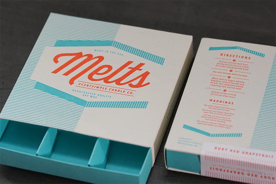 studio-on-fire-melts-letterpress-packaging-tray-peek.jpg