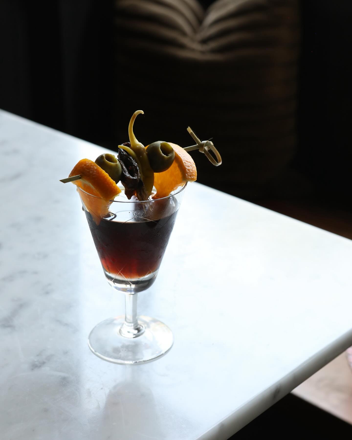Tonight feels like the perfect night to cozy up to a glass of vermouth garnished with a Gilda, don&rsquo;t you think? A traditional Basque pintxo consisting of orange, olives, spicy peppers &amp; an anchovy, this little bite is the perfect pairing fo