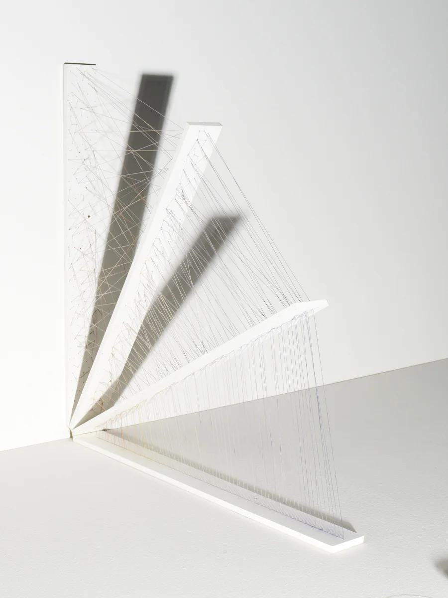 Collapsible order-to-chaos string structure. All four sides of this box can be opened and closed. Photo: Michael Bodiam.