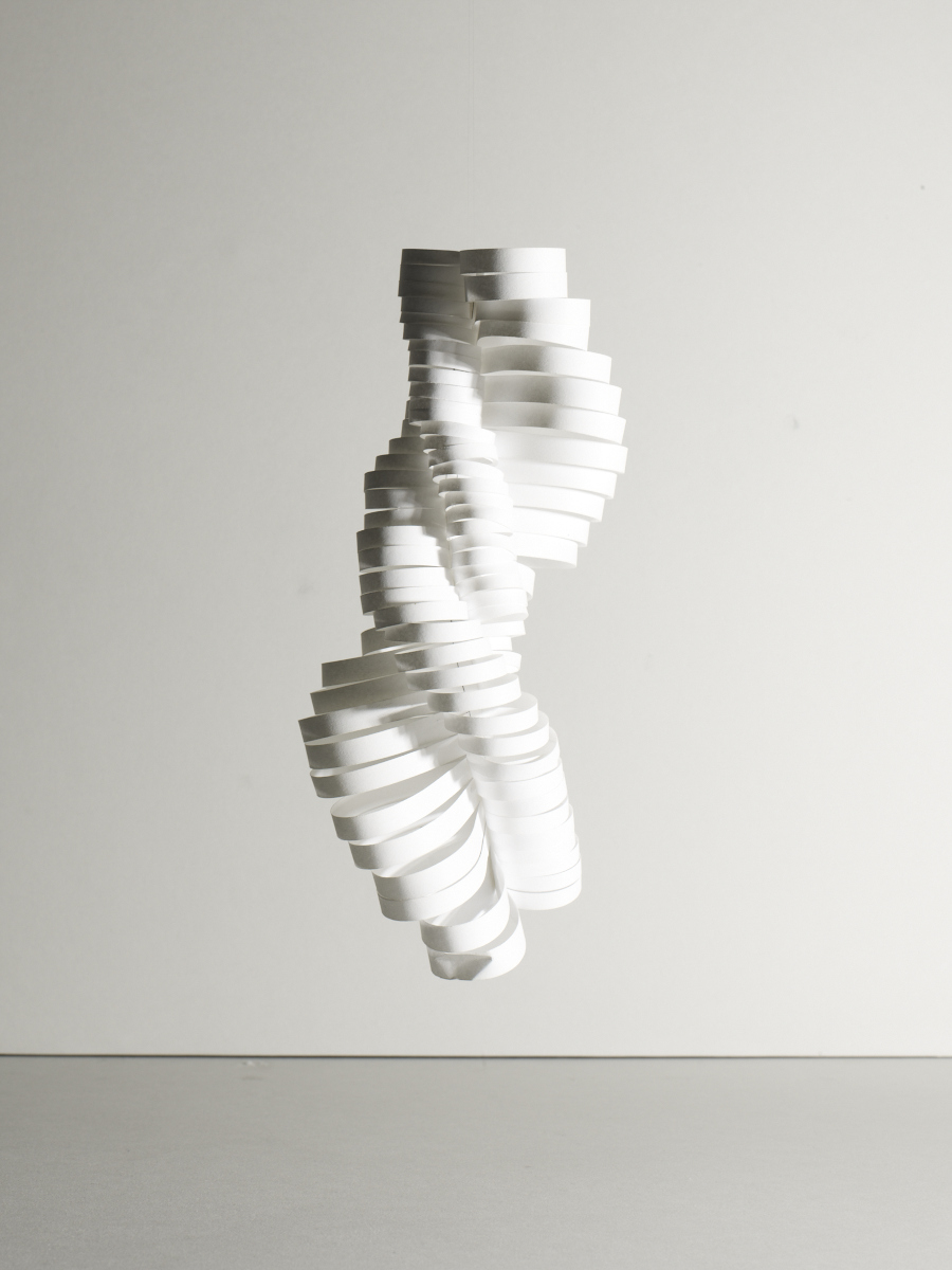  2nd model. Making sculptures of A4 paper. This has turned into a series of spiral mobiles of different materials. Image:  Michael Bodiam.  