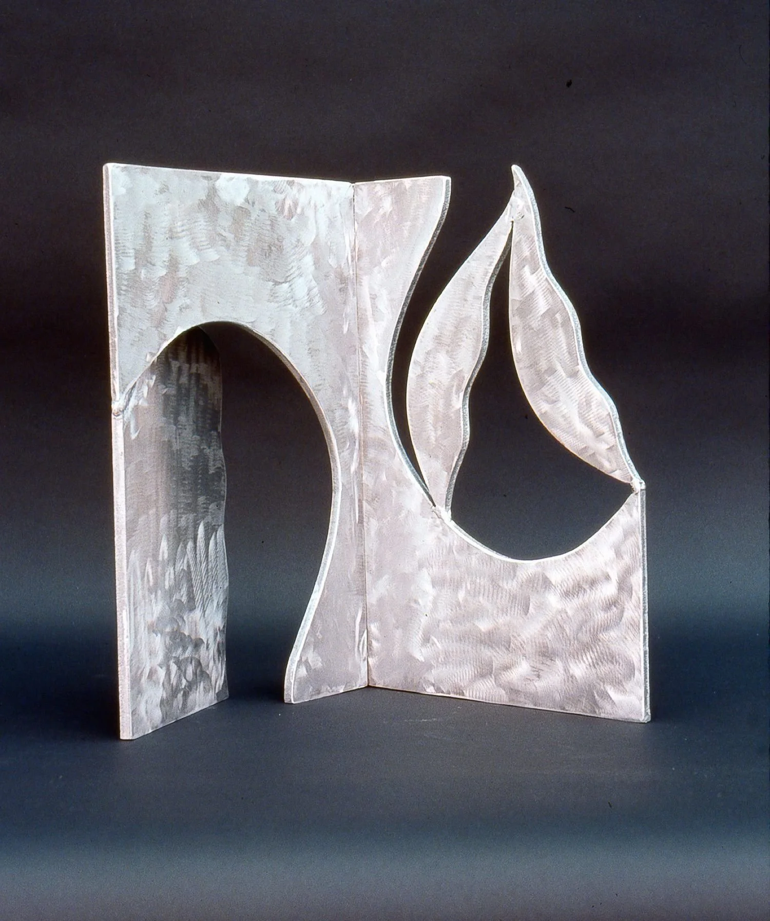 Seeking Truth, 1991, aluminum, 17 x 15in